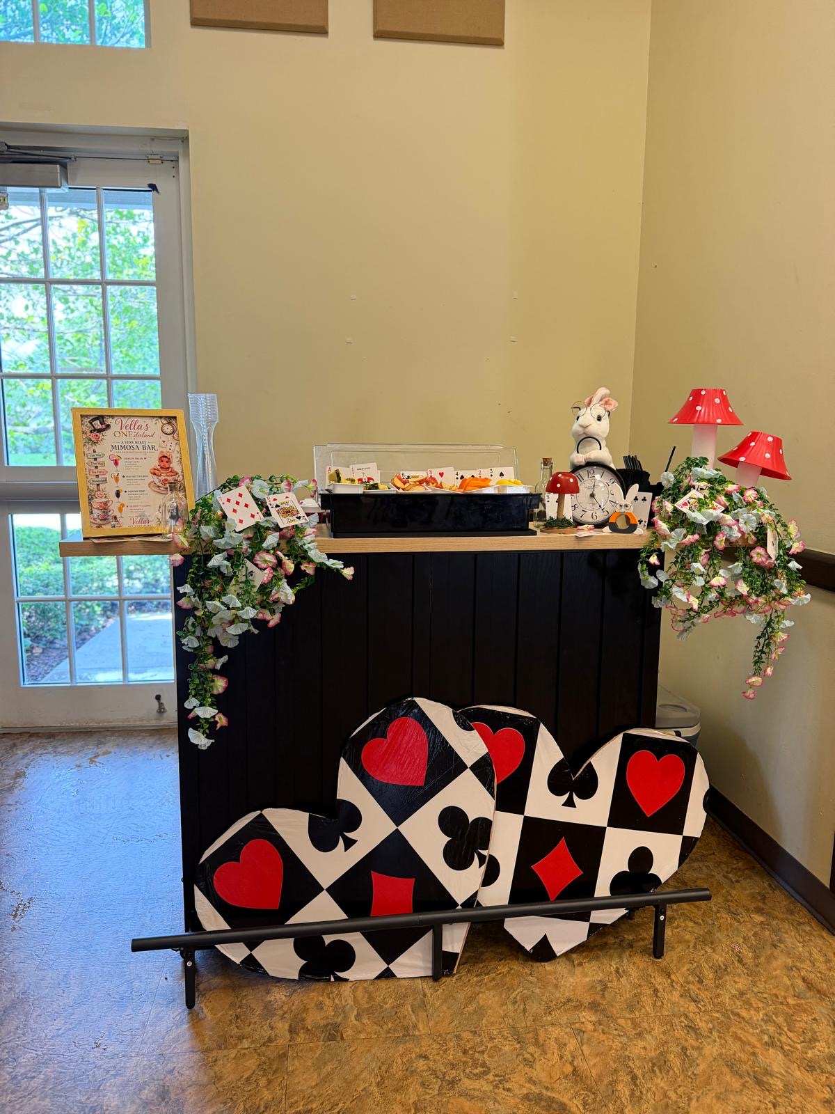 Alice in Wonderland themed mobile bar setup