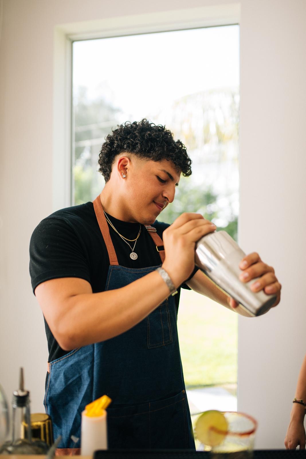 Bartender shaking a cocktail